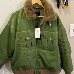 Woman’s Oversized Green Bomber Jacket with Faux Fur Collar